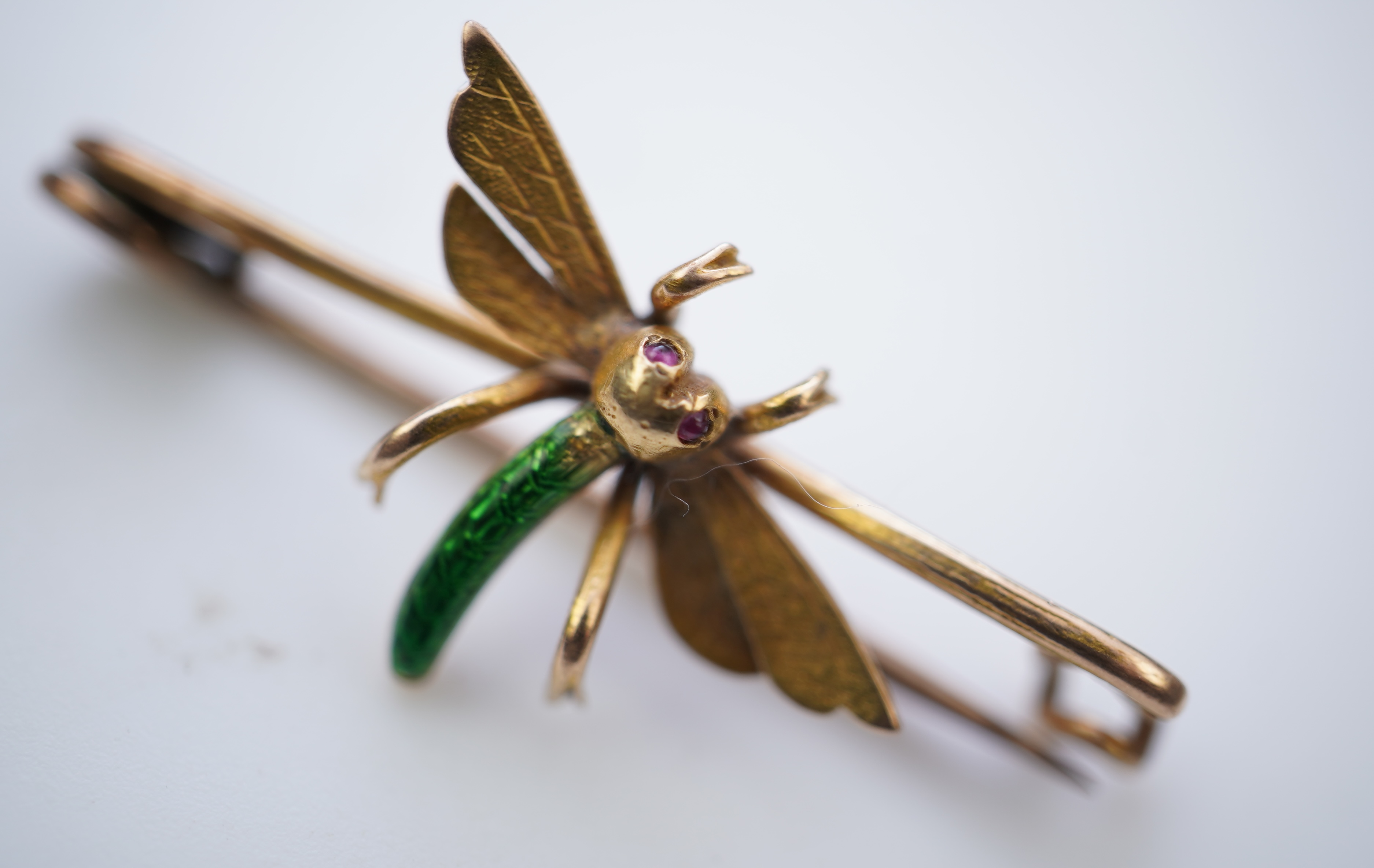 A gold and enamel brooch, early 20th century